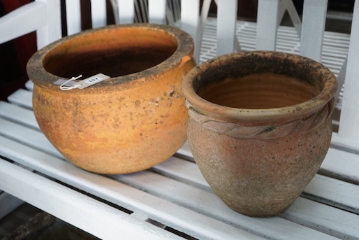 Two circular terracotta garden planters, larger width 38cm, height 23cm